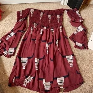 Deep red, with scrape cow skull design